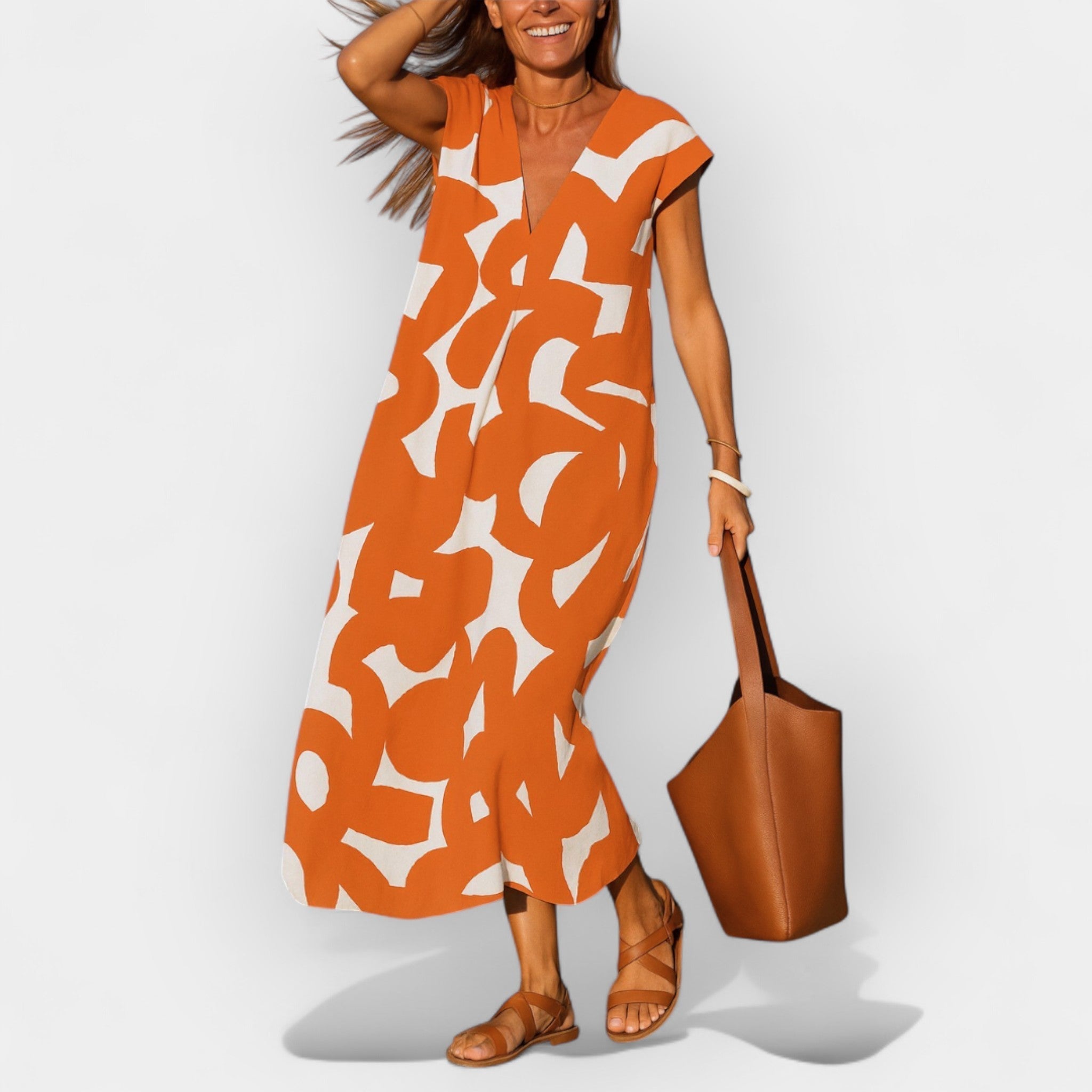 Αέρινο Φόρεμα με V Λαιμόκοψη και Σύγχρονο Σχέδιο