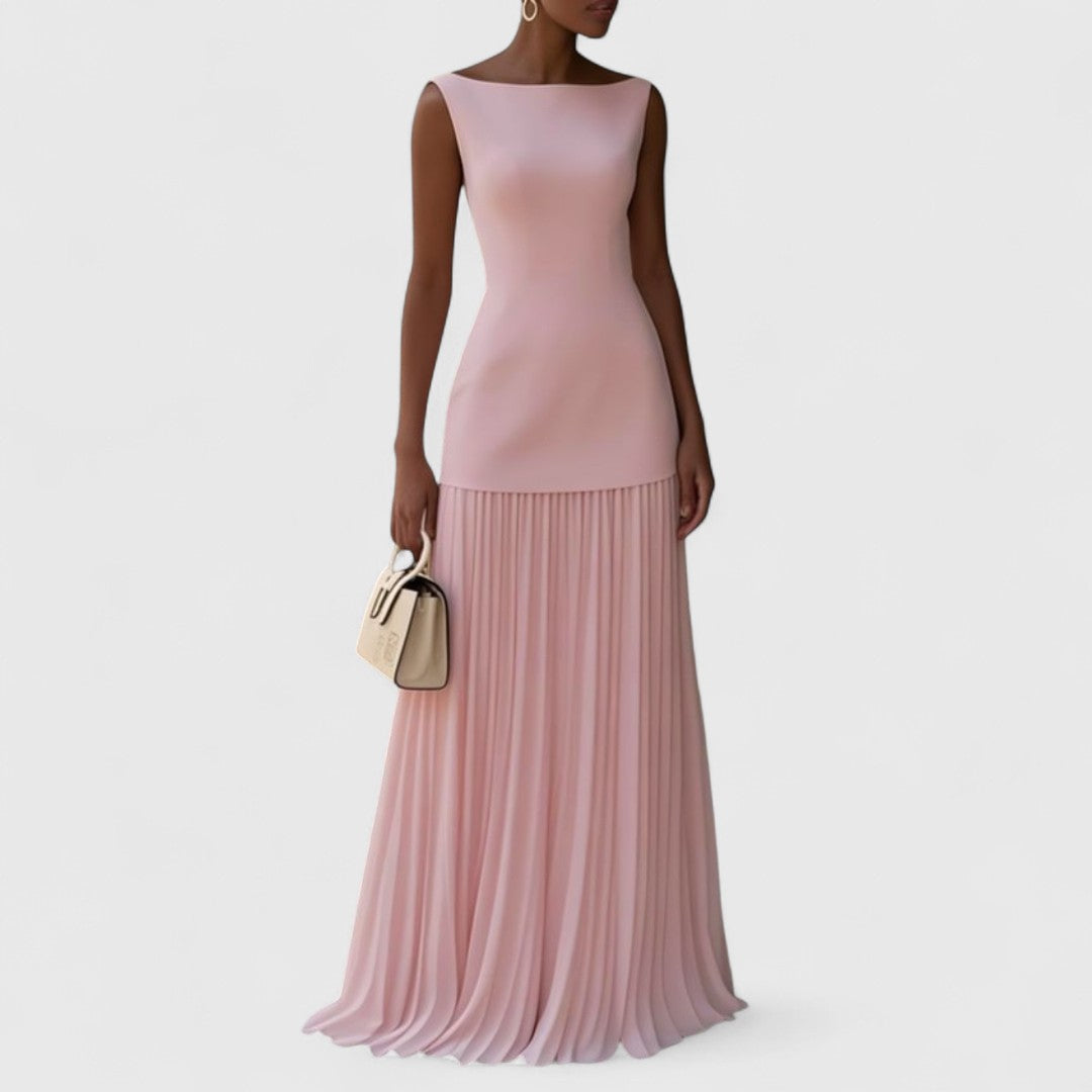 Αργυρώ - Μακρύ πλισέ φόρεμα με ρομαντική κίνηση και διαχρονική χάρη